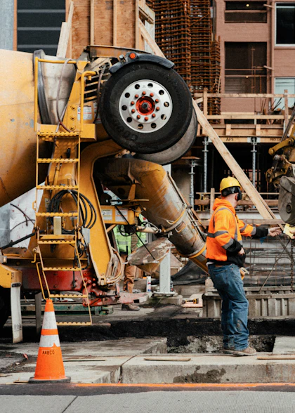 Construction crew pouring concrete